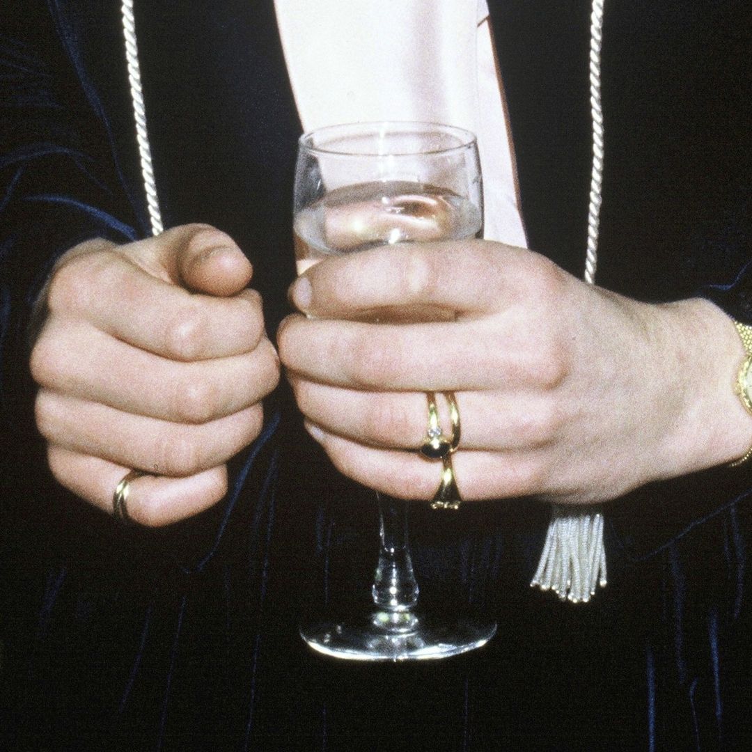 Princess Diana wearing gold rings