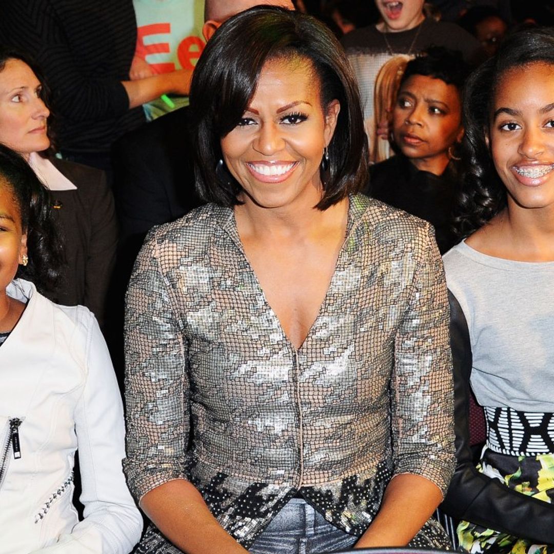 Barack and Michelle Obama's daughters make rare appearance in celebratory family photo