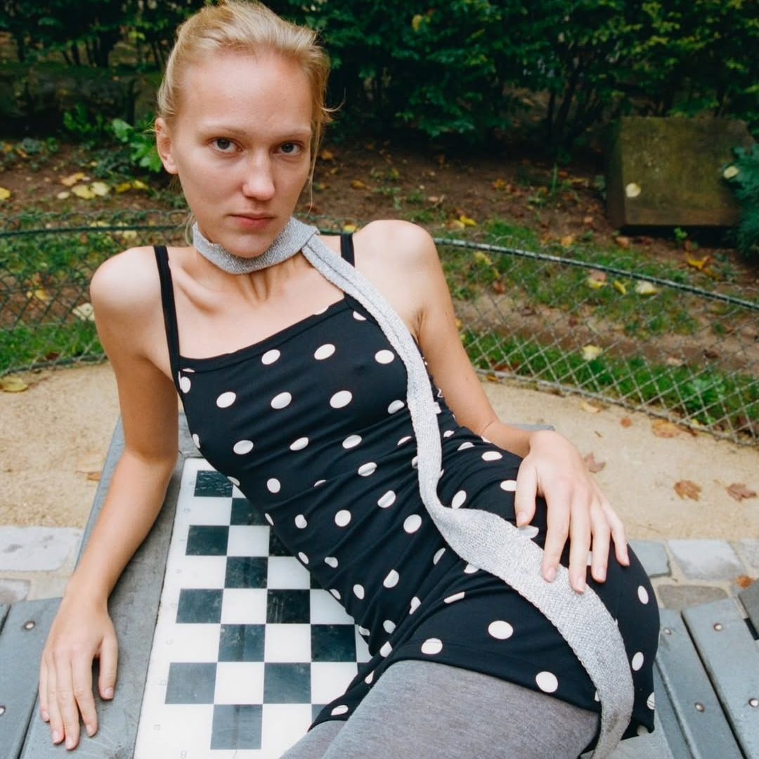 model in polka dot dress