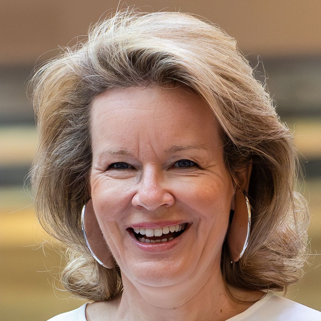 Queen Mathilde looks so glam in waist-cinching sequin dress and gold heels
