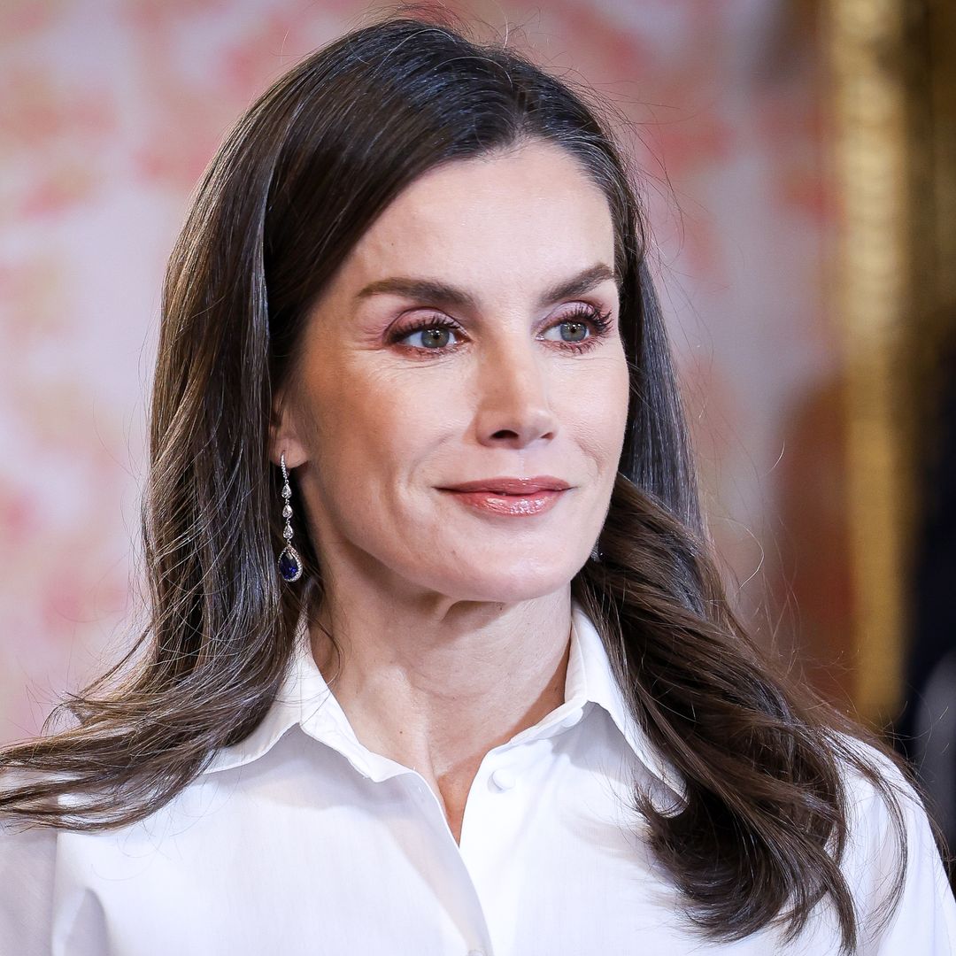 Queen Letizia is an absolute vision in white as she steps out alongside ...