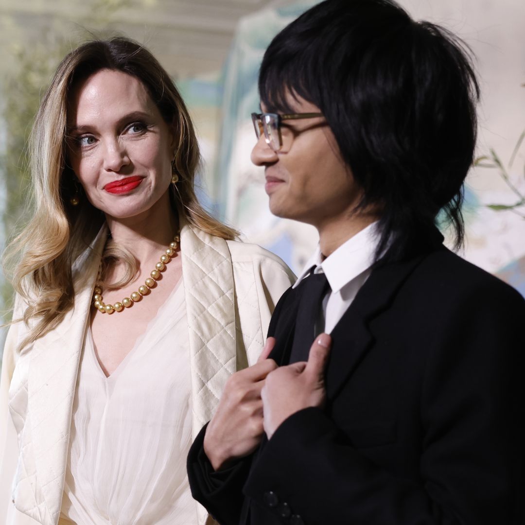 Angelina Jolie looks radiant as she steps out with son Maddox to White House state dinner