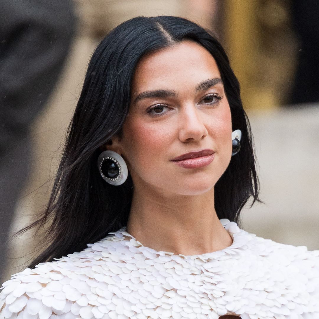 Dua Lipa celebrates milestone in backless gown
