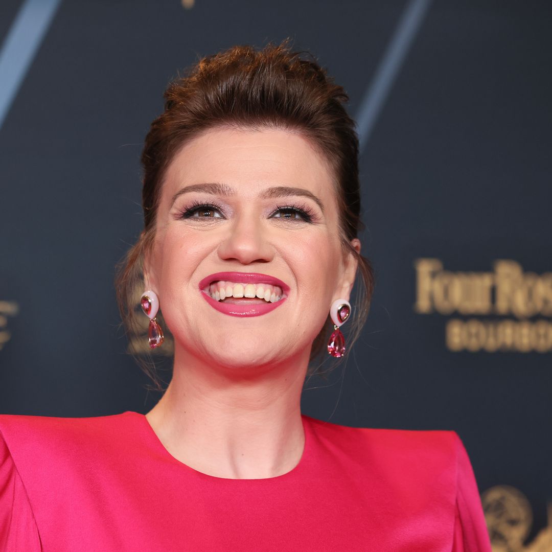 Kelly Clarkson is shining bright in a $400 rainbow-colored mini dress