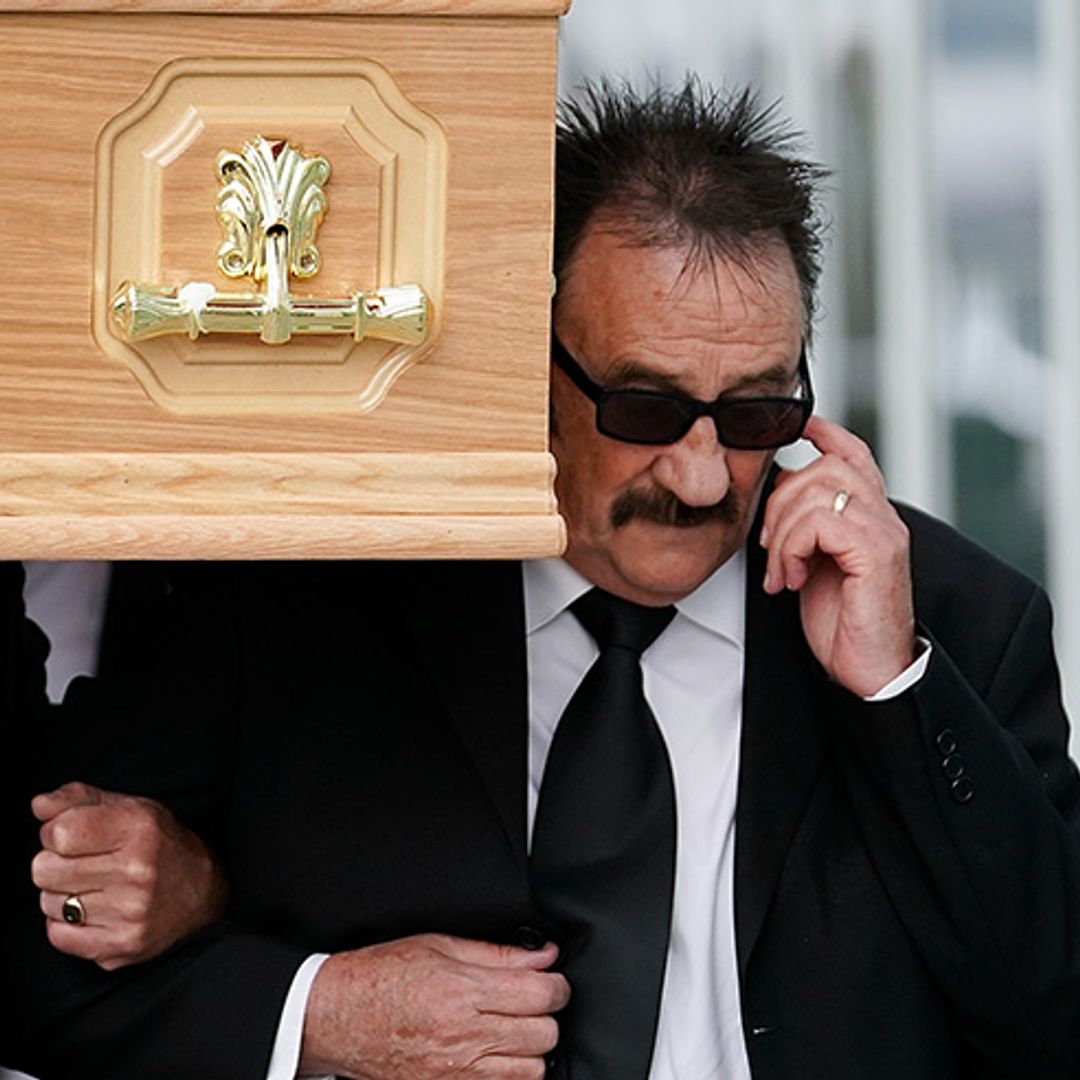 Paul Chuckle in tears as he carries brother Barry's coffin at funeral