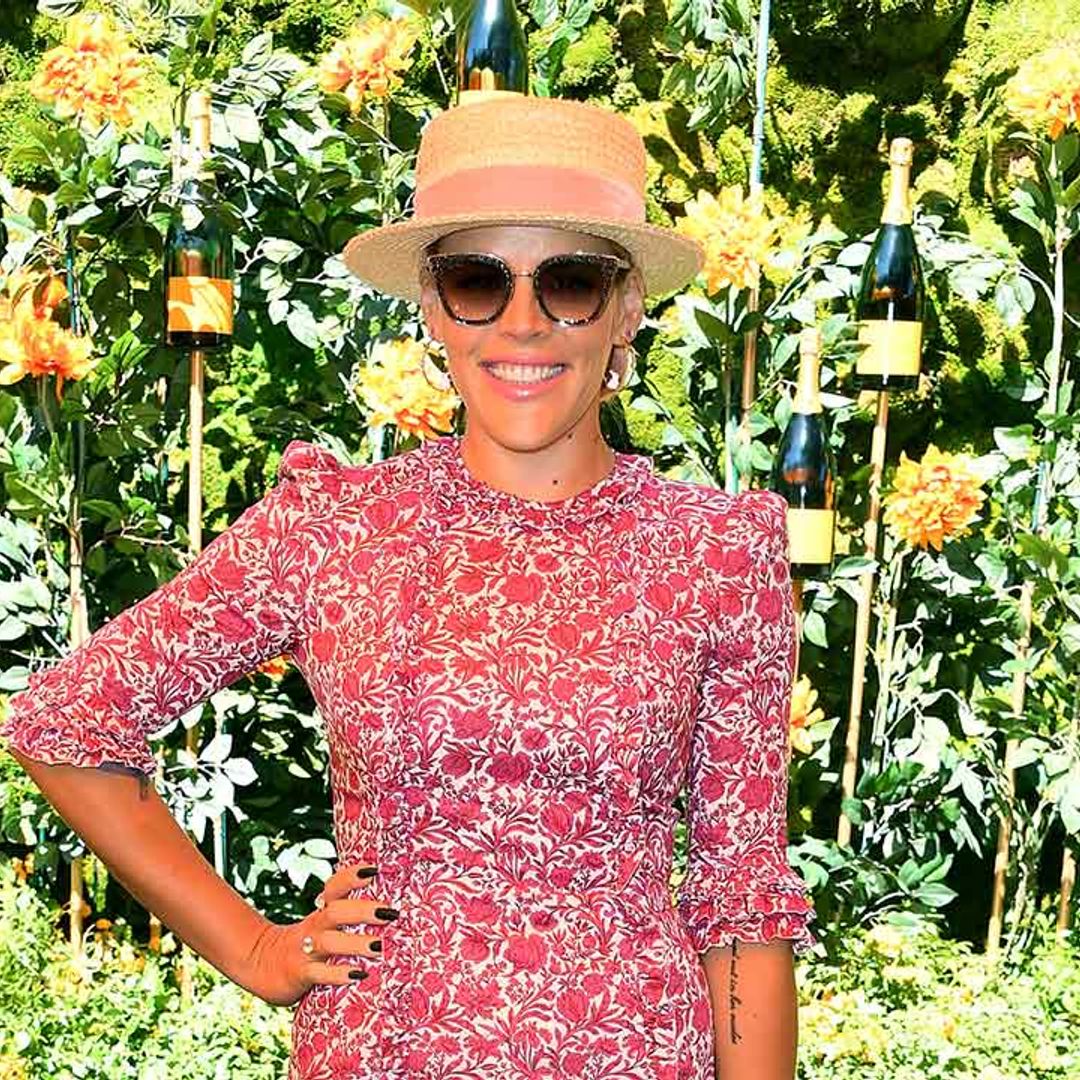 Busy Philipps causes a stir as she poses in crocheted top for basketball game
