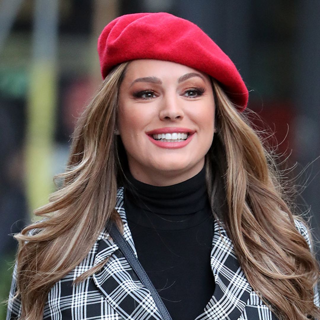 Kelly Brook is flawless in stunning festive mini-dress and tights