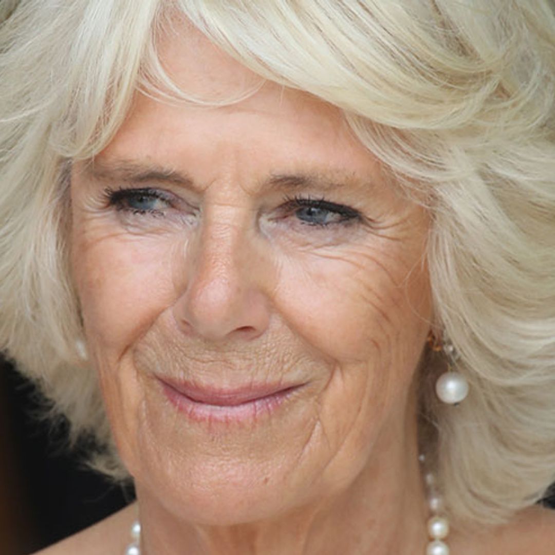 The Duchess of Cornwall is pretty in pink and wow, what an outfit!