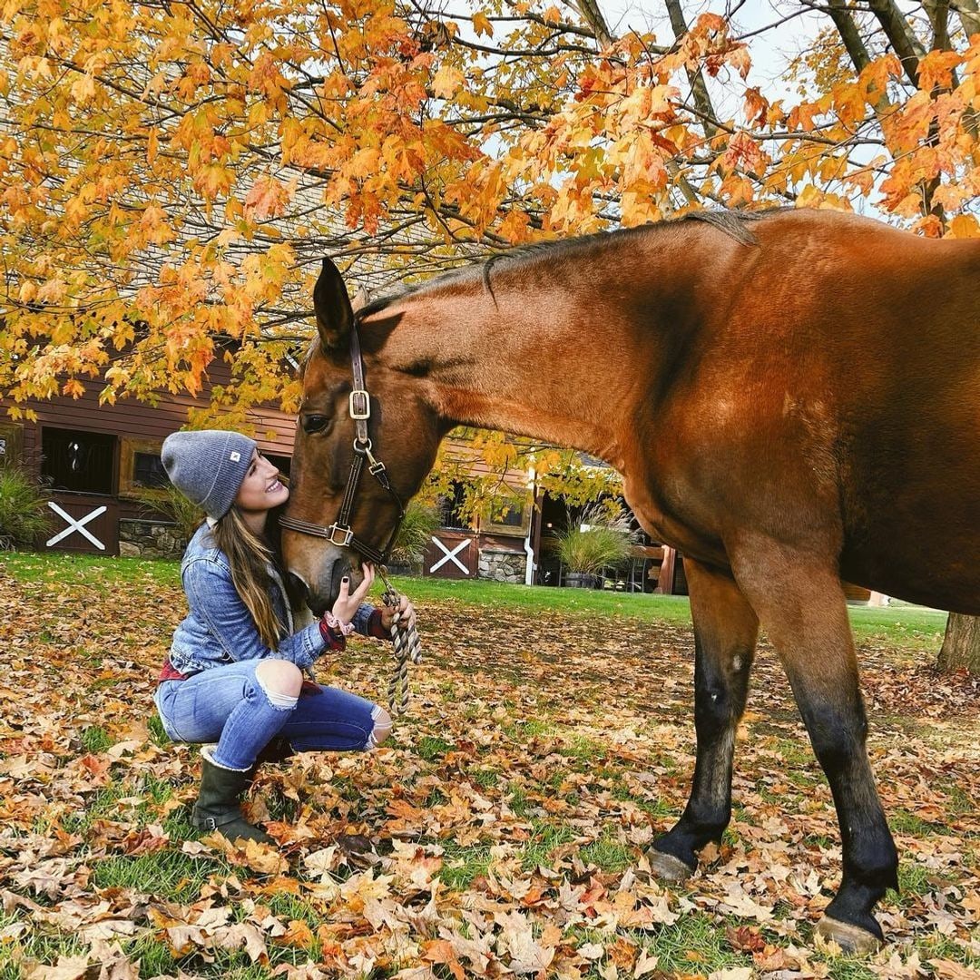 Jessica Springsteen cozies up to one of her horses on the family farm in Colts Neck, New Jersey, shared on Instagram