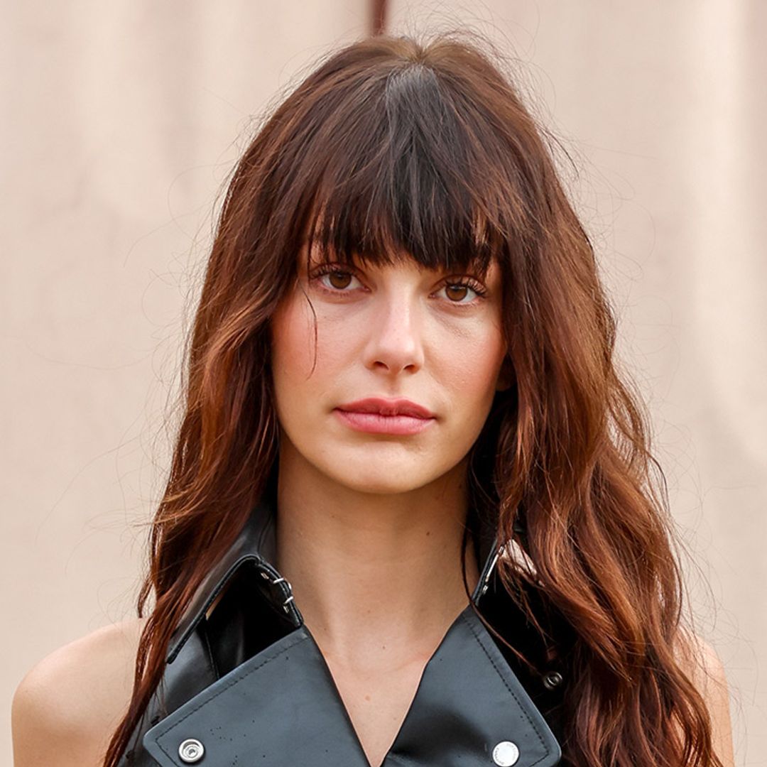 Camila Morrone shows off the ultimate fringe winter hairstyle at Burberry's Spring 2023 show