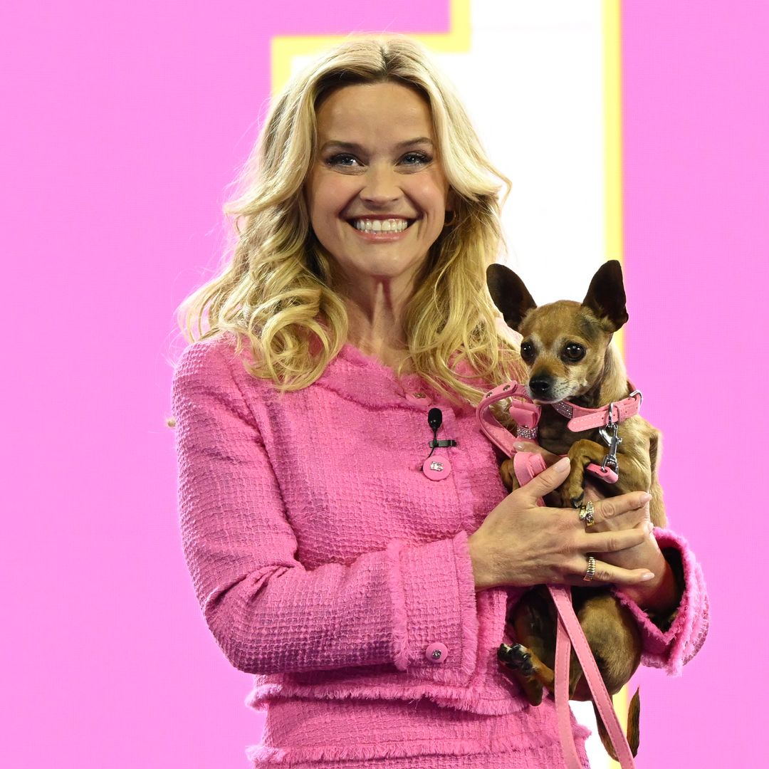 Reese Witherspoon is age-defying in Elle Woods pink mini skirt