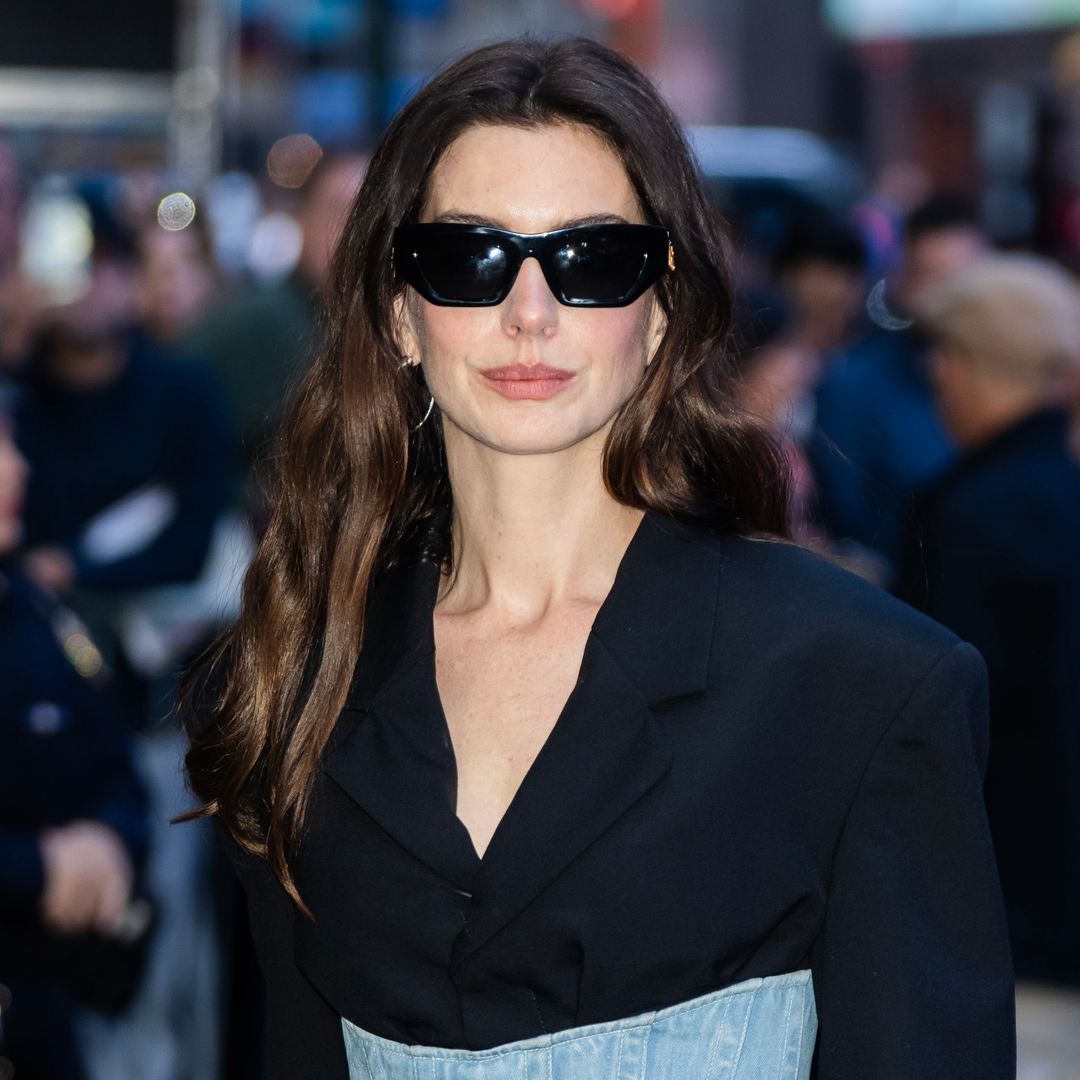 Anne Hathaway just wore the most bizarre denim corset suit of all time