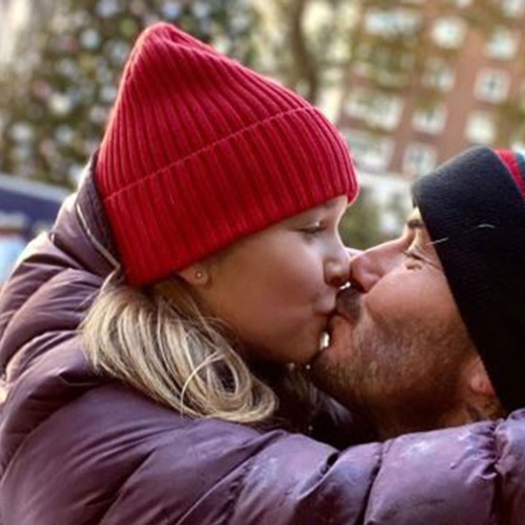 David Beckham kisses daughter Harper on the lips during fun day out