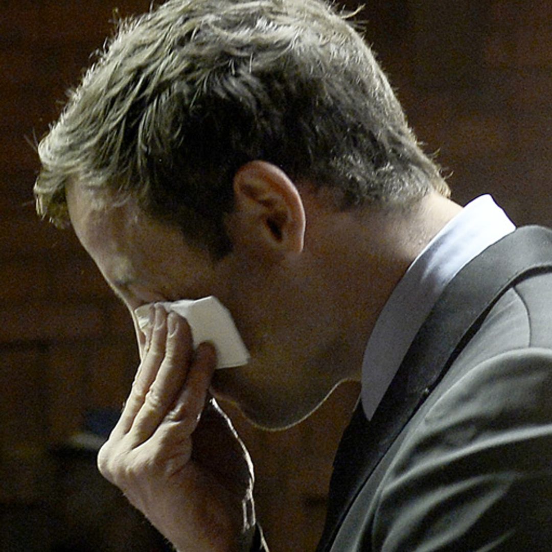 Emotional Oscar Pistorius breaks down in tears as he is formally charged and his trial date is set