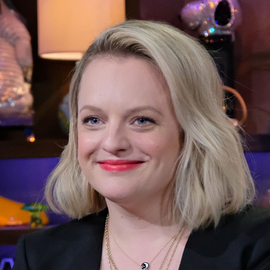 Elisabeth Moss stuns in orange suit and bustier for divisive late night appearance