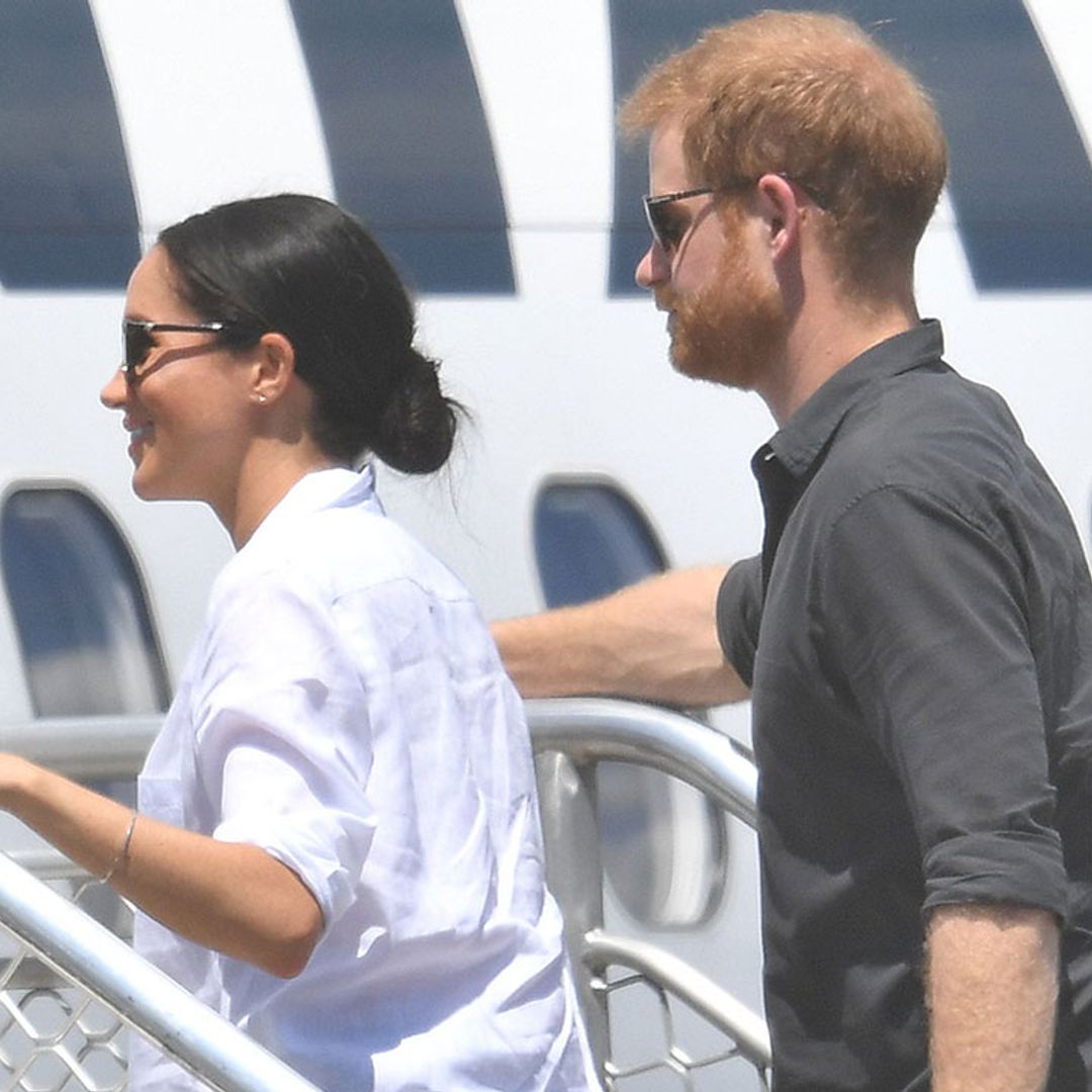 Meghan Markle nails airport chic in Cape Town, wowing in white jeans and Everlane nude flats