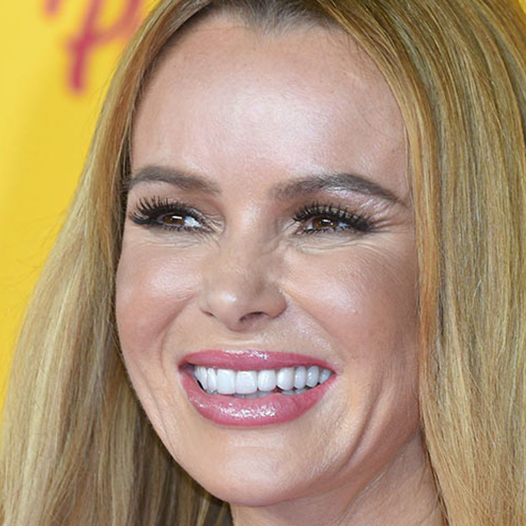 Amanda Holden's lilac satin blouse is sending her fans wild and we can totally see why