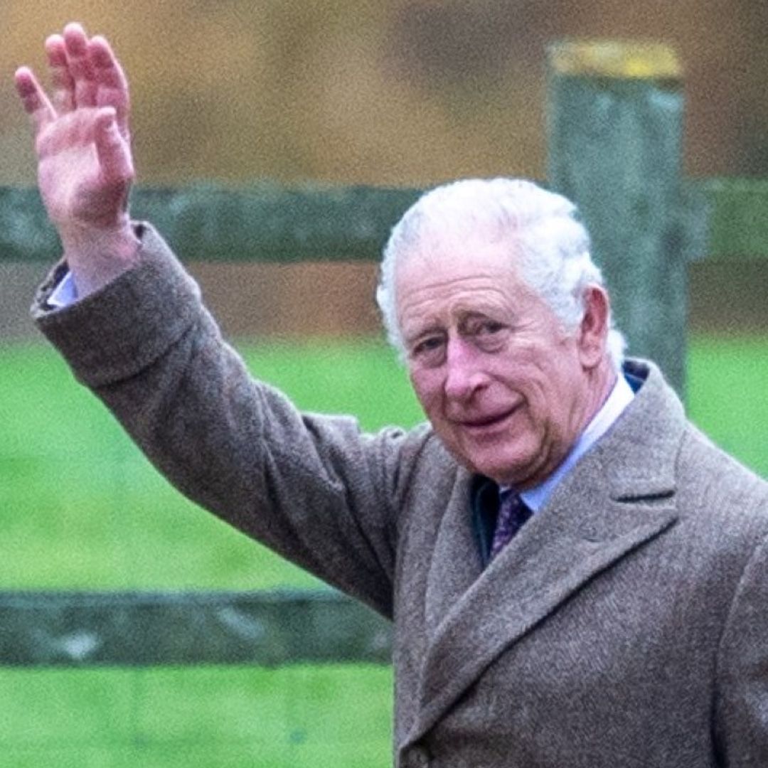 King Charles waves to fans as he attends church at Sandringham