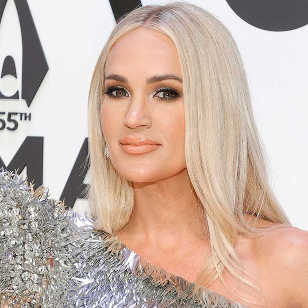 Carrie Underwood wows in dazzling silver mini dress ahead of Las Vegas return