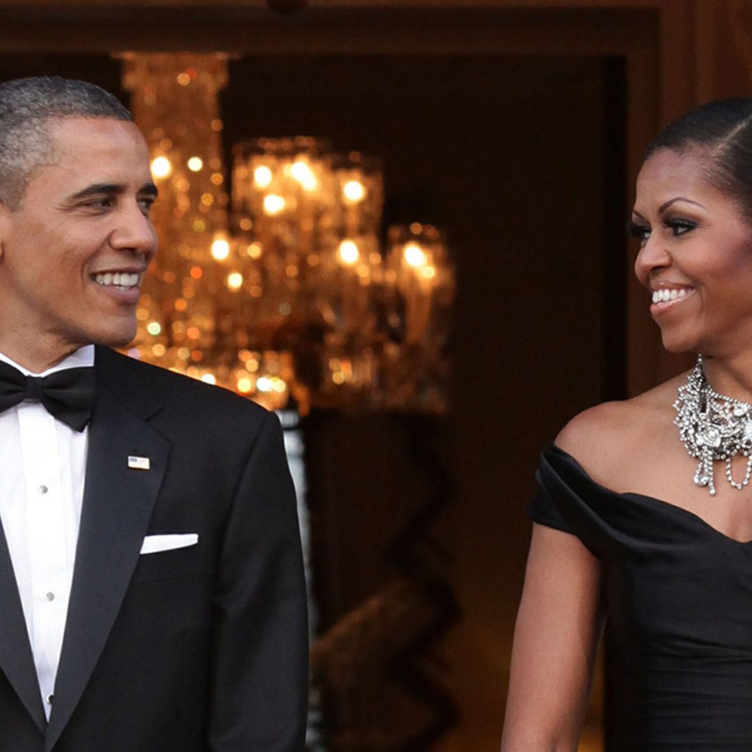 Michelle Obama and husband Barack look so happy in intimate kissing photos