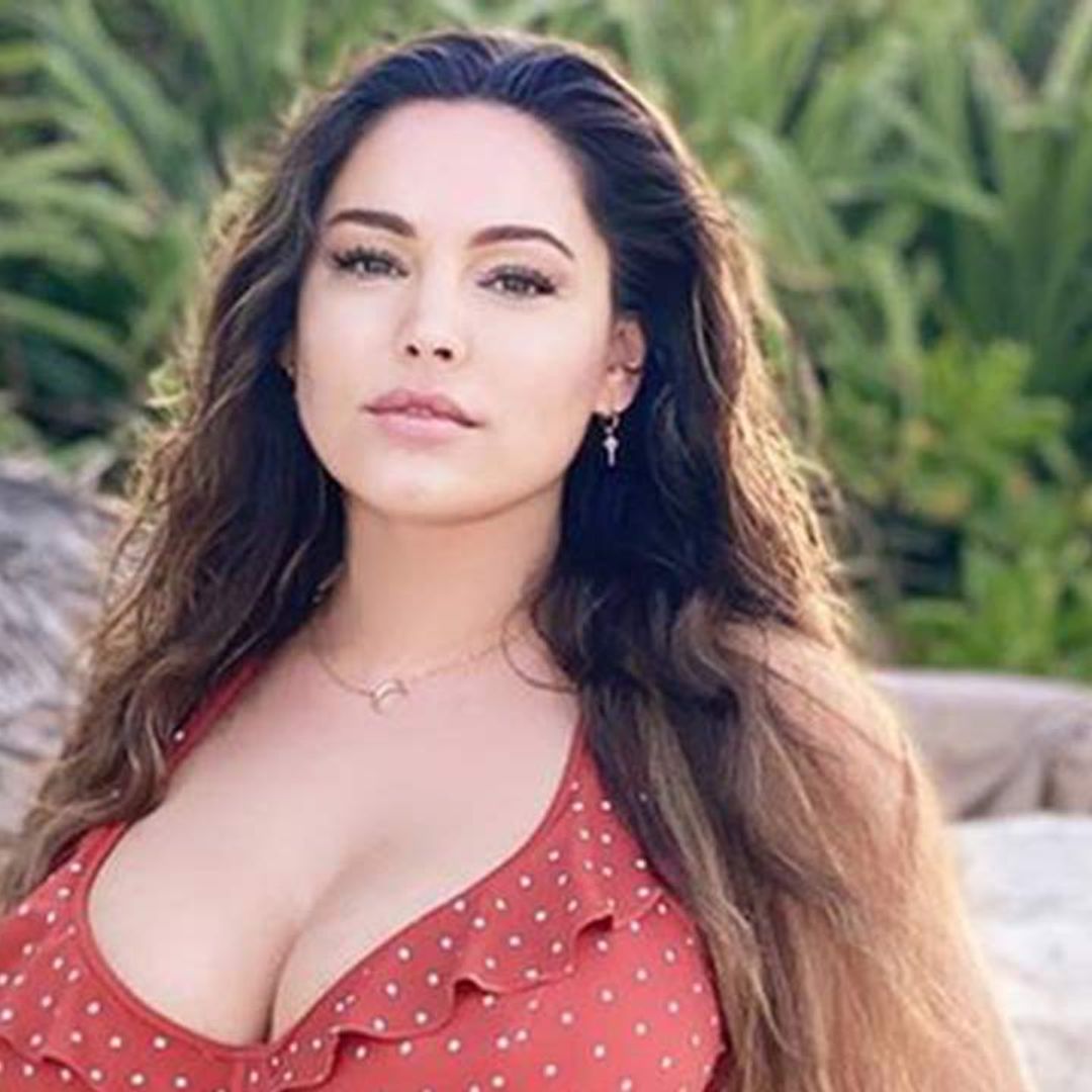 Kelly Brook floors fans in skimpy red swimsuit for intimate hot tub selfie