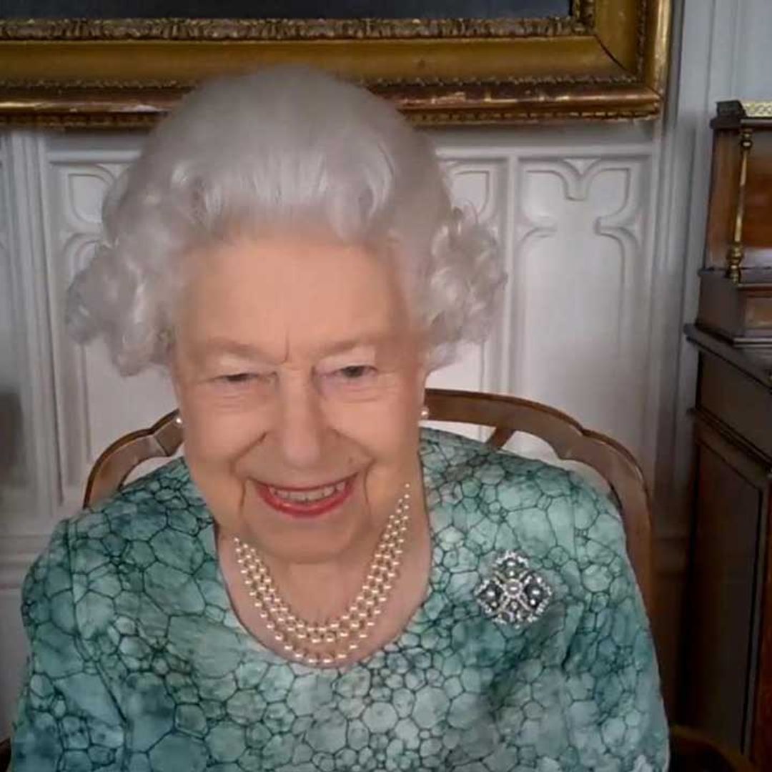 The Queen charms scientists as she's shown 'fascinating' pictures of Mars