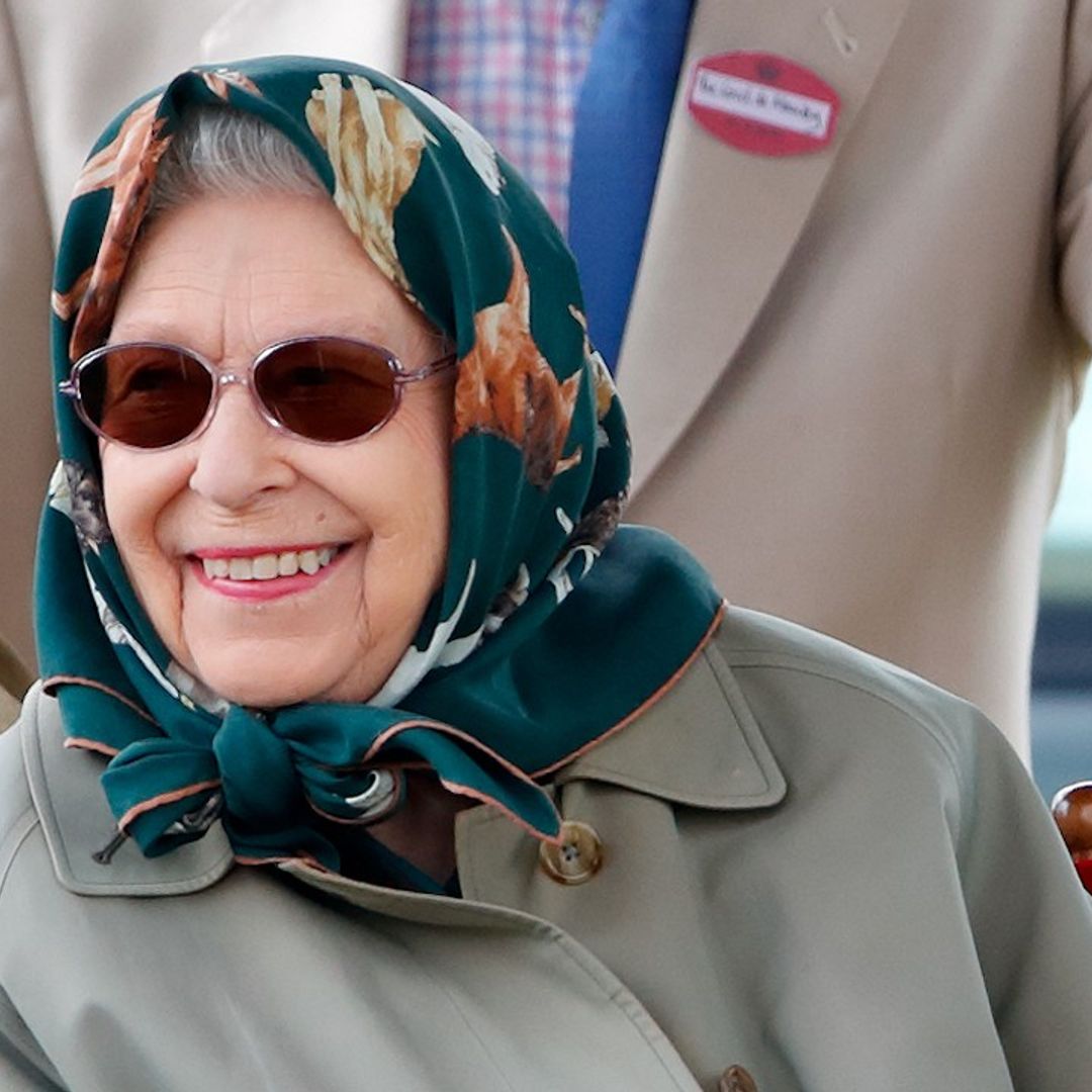 The Queen styles up her casual headscarf with bold lipstick, and we love her for it