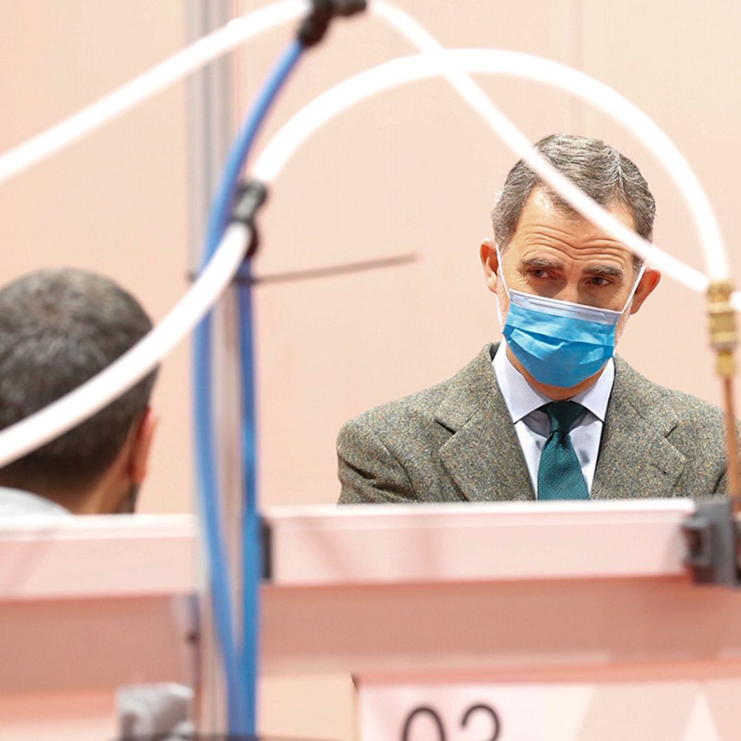 King Felipe of Spain makes hospital visit in gloves and face mask during coronavirus pandemic