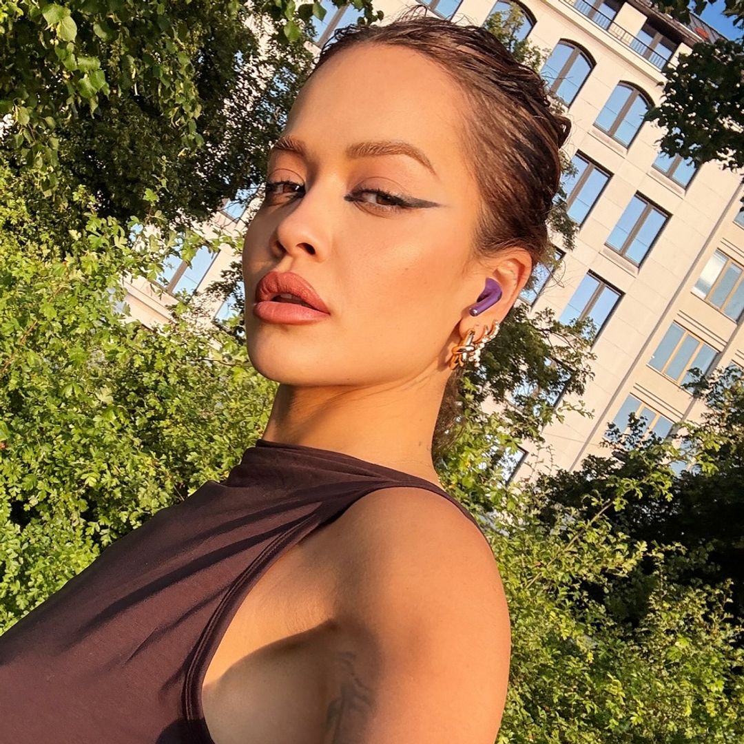 Rita Ora just styled an itsy bitsy bikini under a sheer cover-up for a celebratory night out