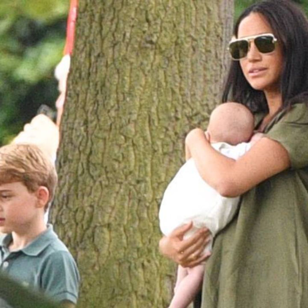 Doting mum Meghan Markle sweetly kisses baby Archie during his first public outing