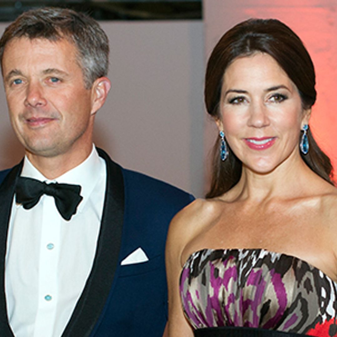 Princess Mary of Denmark is the belle of the ball with dance partner Prince Frederik – watch