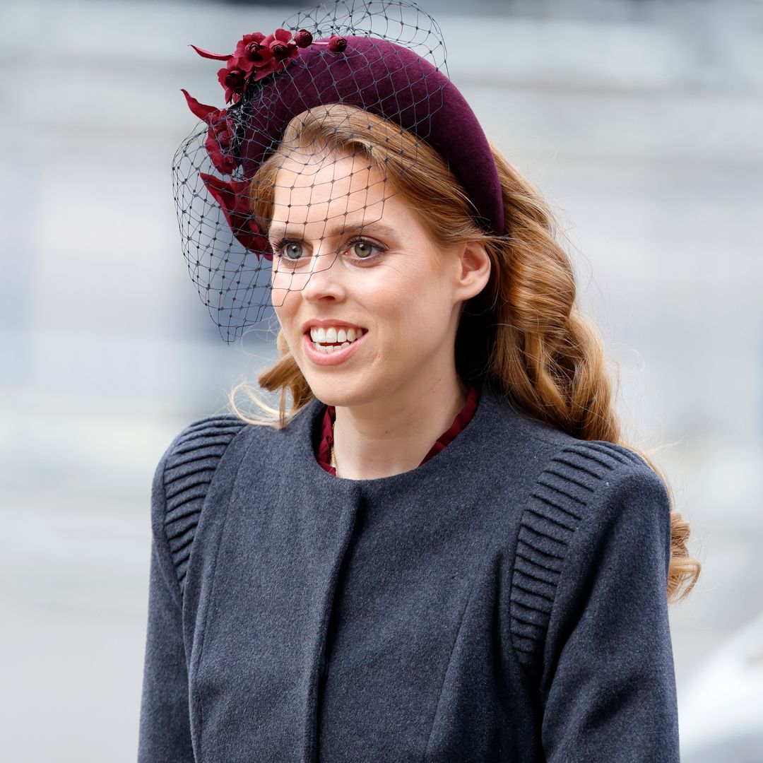 Princess Beatrice is a vision of grace and glamour in fitted coat and veil