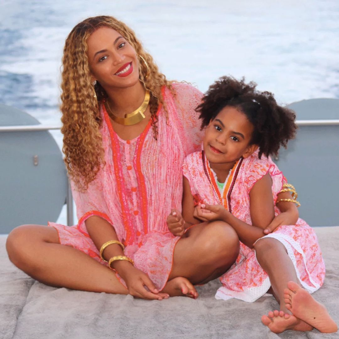 Beyoncé and Blue Ivy Carter pose for a photo on a yacht while on vacation, shared on Beyonce.com