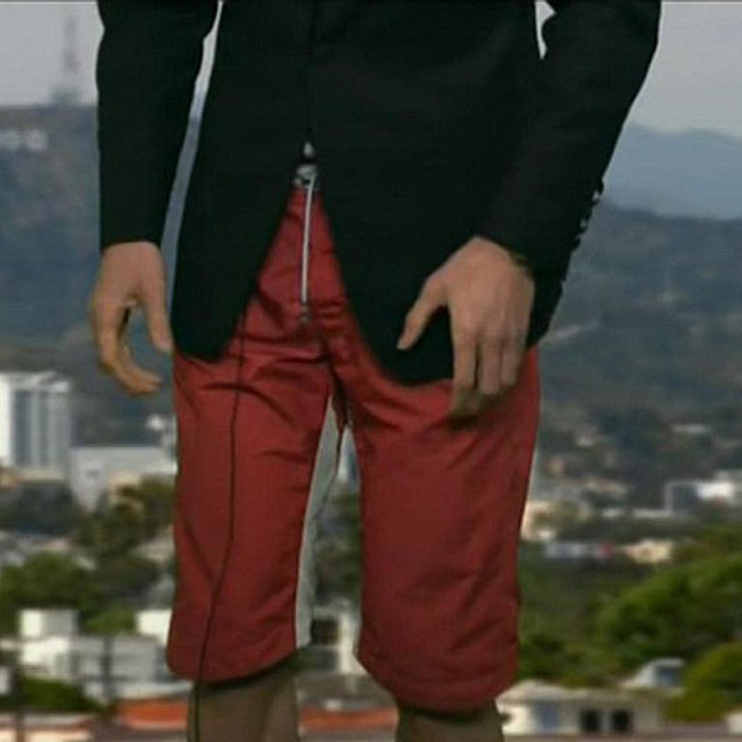 Benedict Cumberbatch accepts best detective trophy – in his swimming shorts