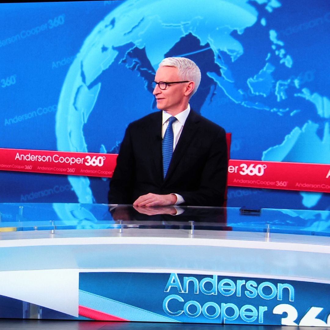 Anderson Cooper at his Anderson Cooper 360 desk