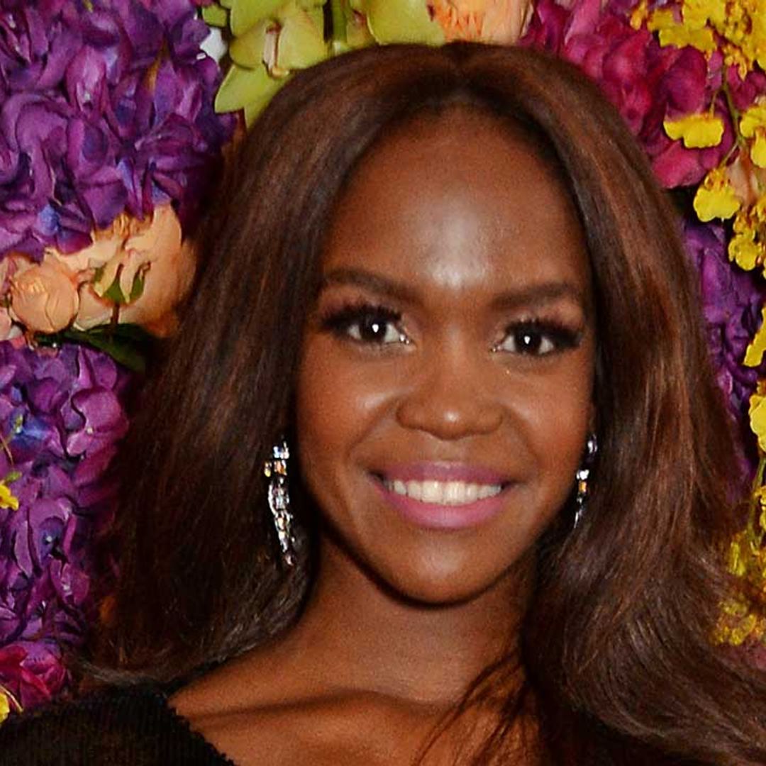 Oti Mabuse shows off her abs in vibrant blue gym set