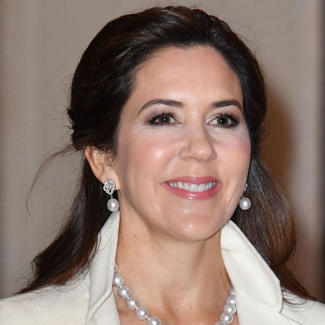 Crown Princess Mary is the epitome of elegance in a white gown at a Copenhagen castle
