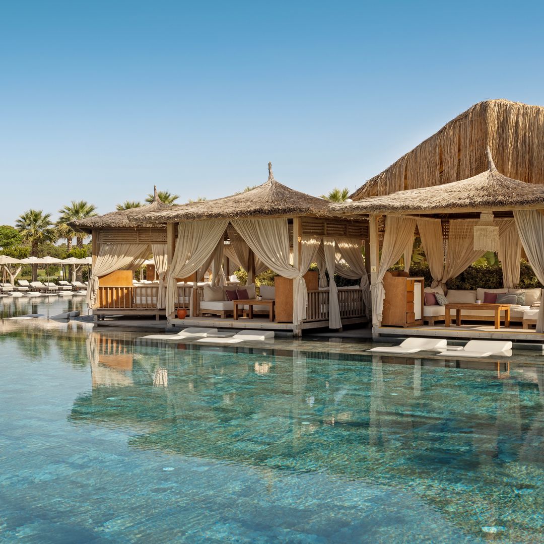 luxury pool with private loungers