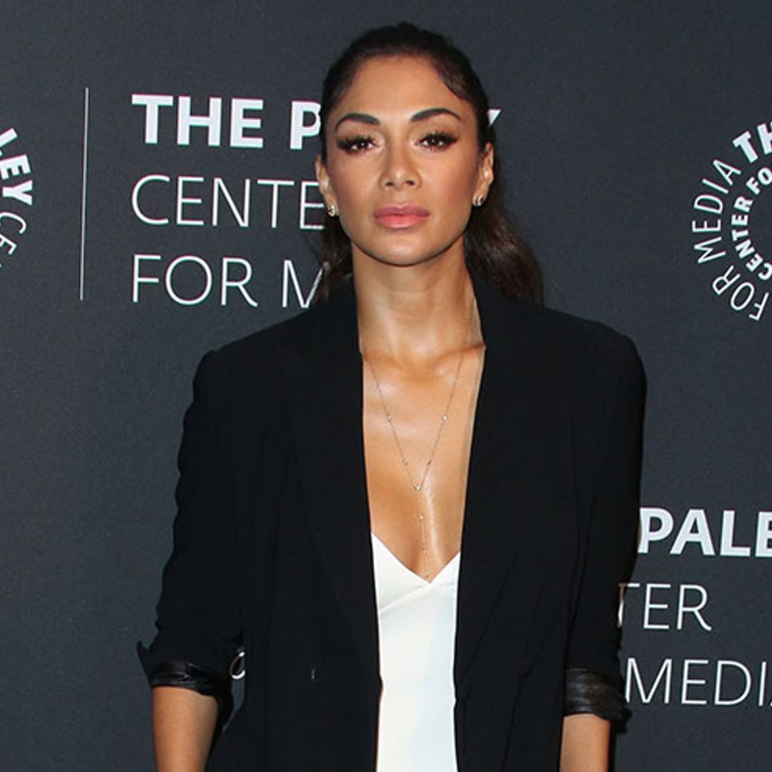 Nicole Scherzinger works a sultry red carpet look at the Dirty Dancing premiere