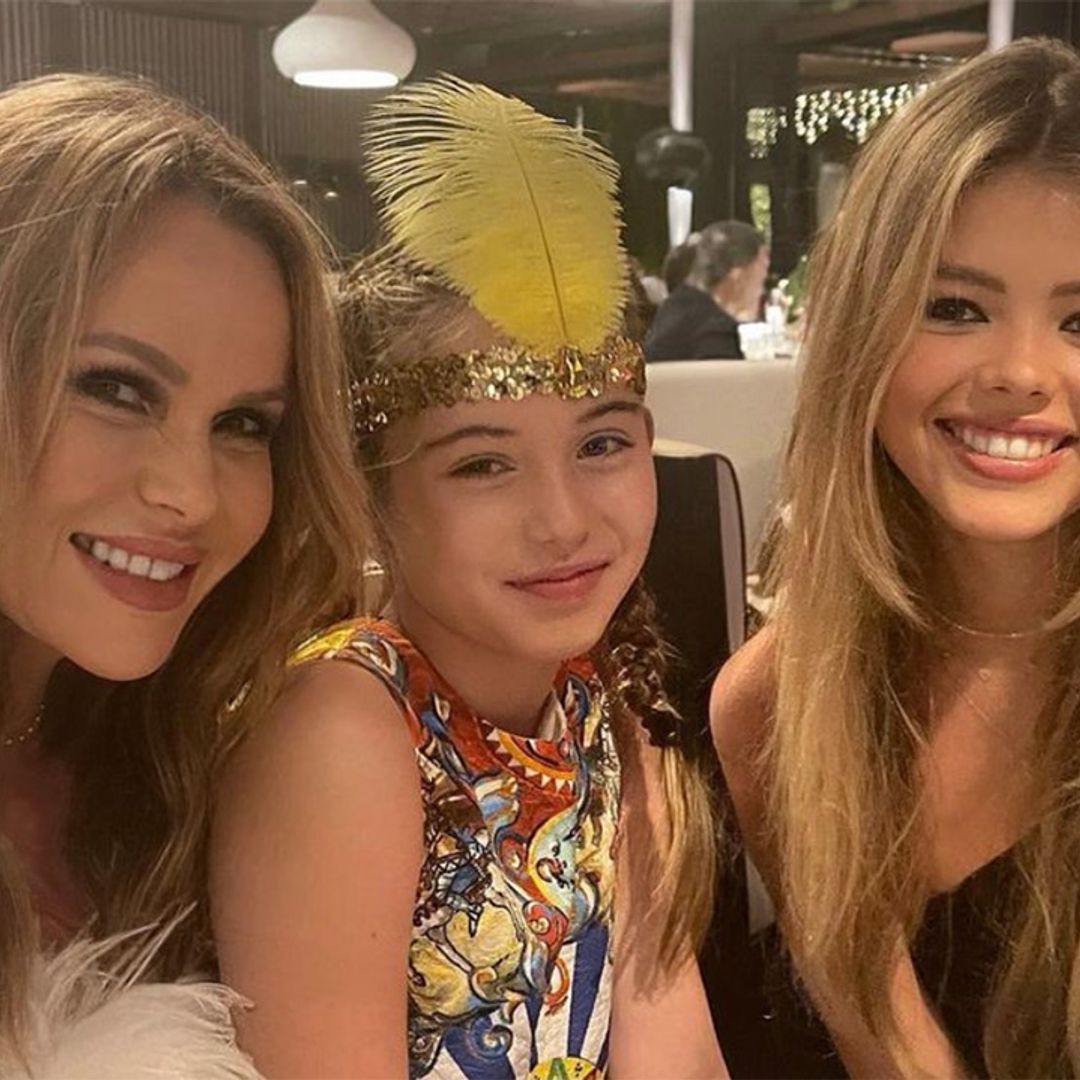 Amanda Holden poses with model daughter in feather mini dress - see photo