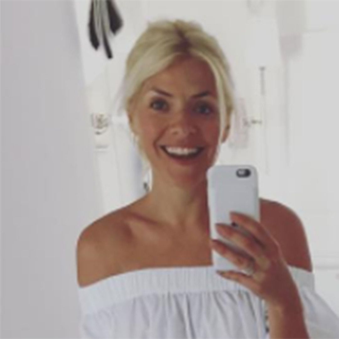 Holly Willoughby shows off tanned and toned legs in tiny shorts