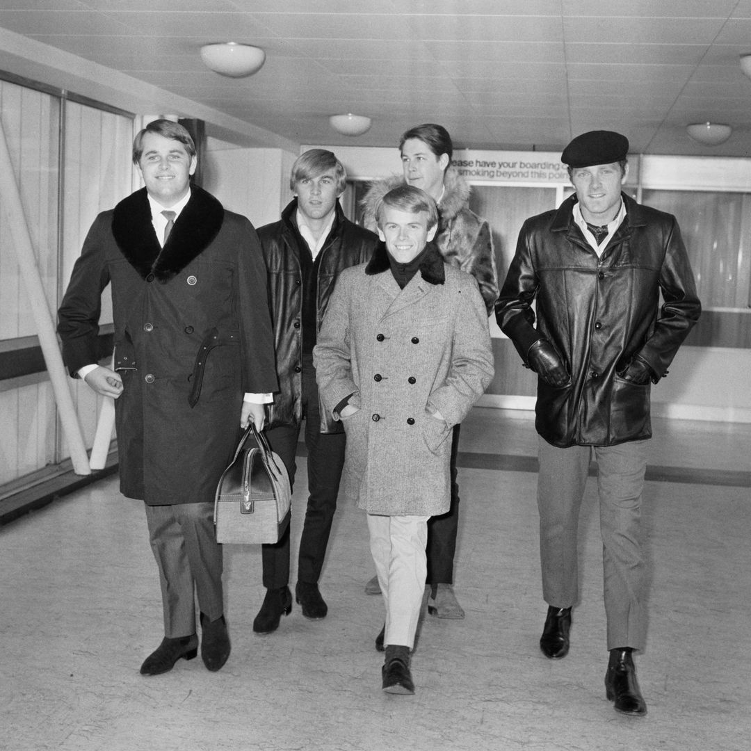 American rock band The Beach Boys at London Airport, UK, 1st November 1964. From left to right, Carl Wilson, Dennis Wilson, Al Jardine, Brian Wilson and Mike Love. (Photo by George Stroud/Express/Getty Images)