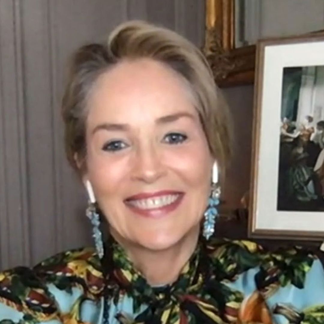 Sharon Stone  is stunning in figure-hugging dress as she shows off new hair inside her grand bedroom