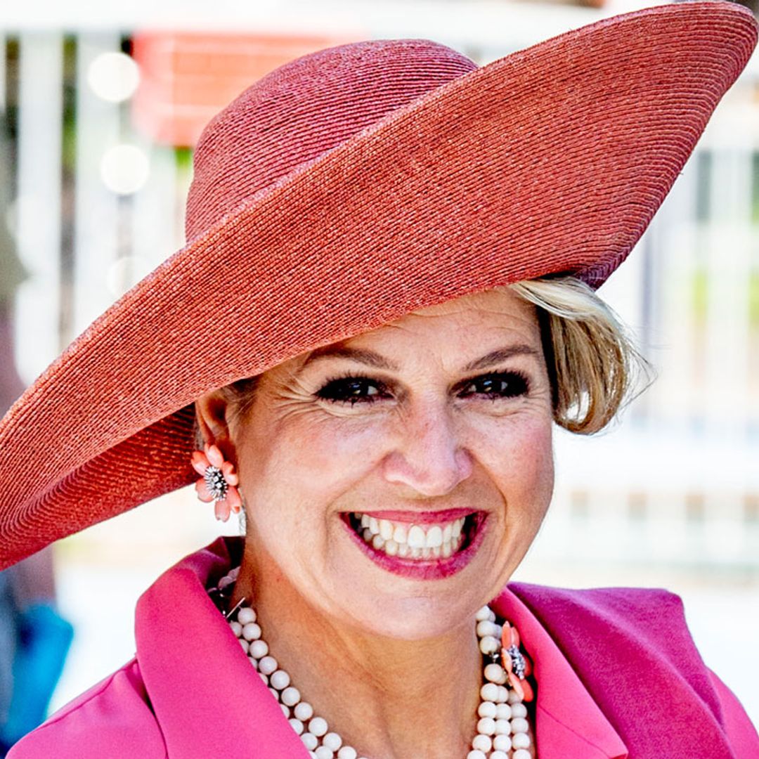 Queen Maxima makes a statement in hot pink look for new outing
