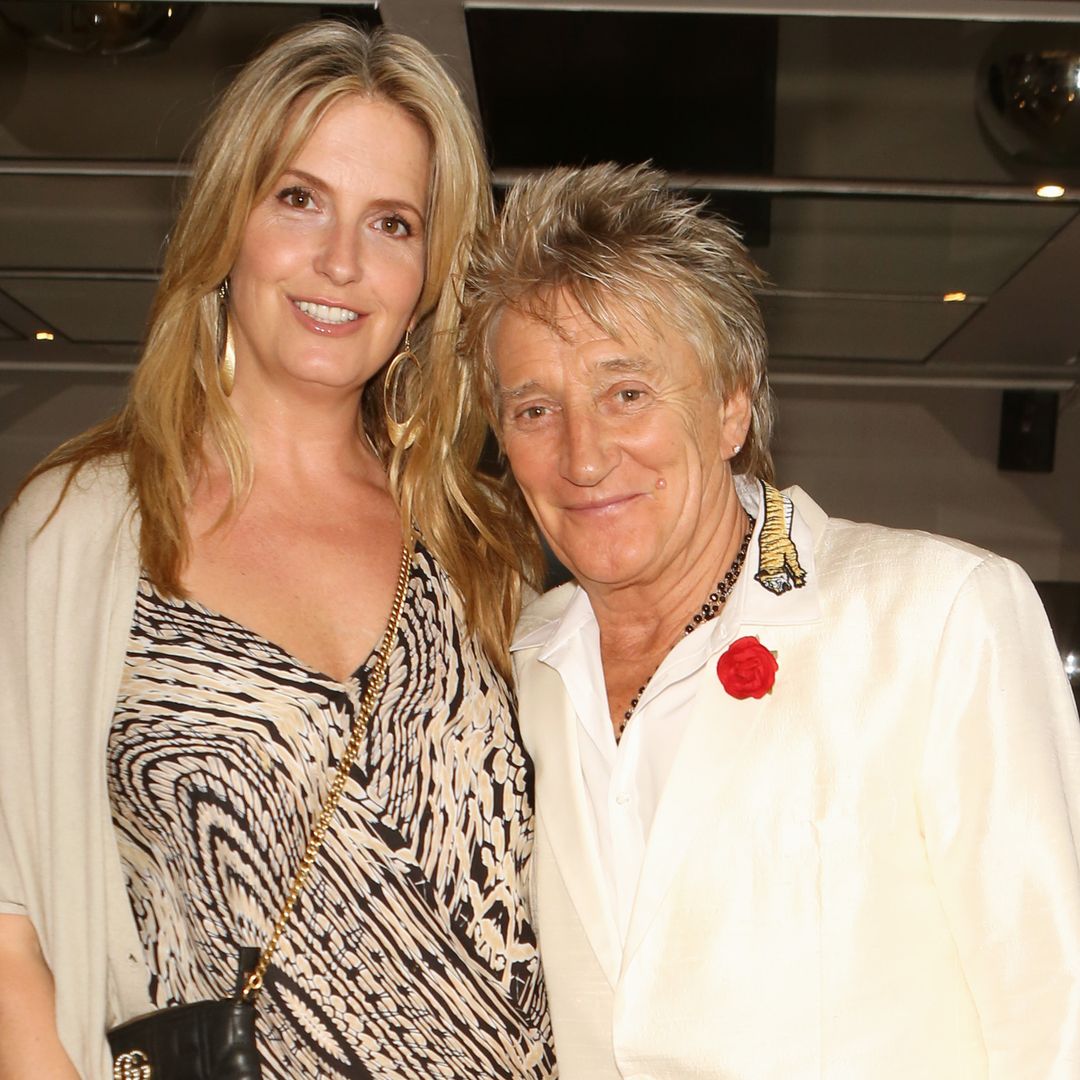 Penny Lancaster is an absolute beachside stunner in bold animal-print dress with sky-high slit