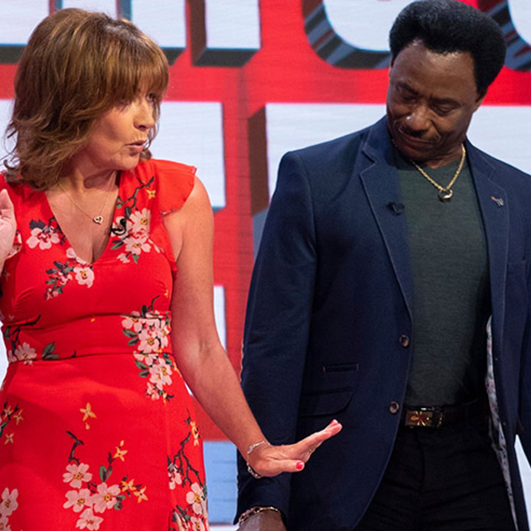 Lorraine Kelly sexy dances while wearing a gorgeous red dress (and it's a steal!)