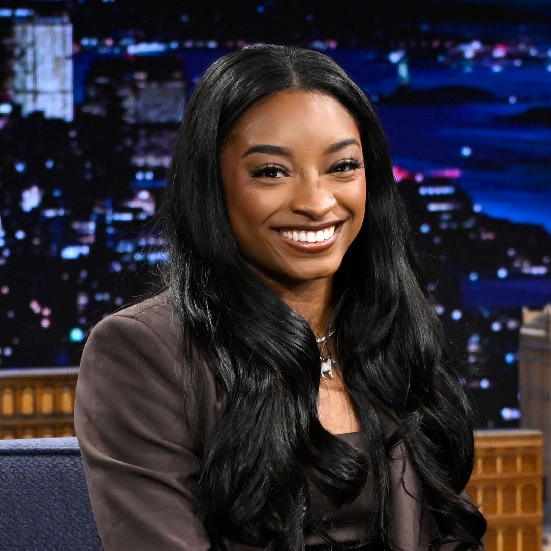 Simone Biles poses in stunning little black dress while looking back on time with husband Jonathan Owen