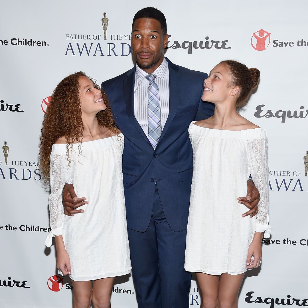 Michael Strahan's daughters catching up to 6ft 4 dad in head-turning celebratory photos