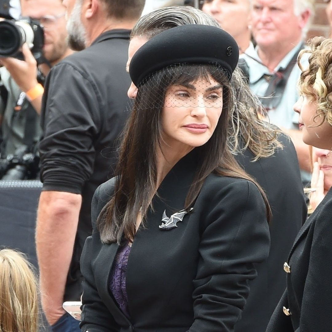Sharon and Ozzy Osbourne's rarely-seen daughter Aimee makes tearful appearance with family at dad's procession