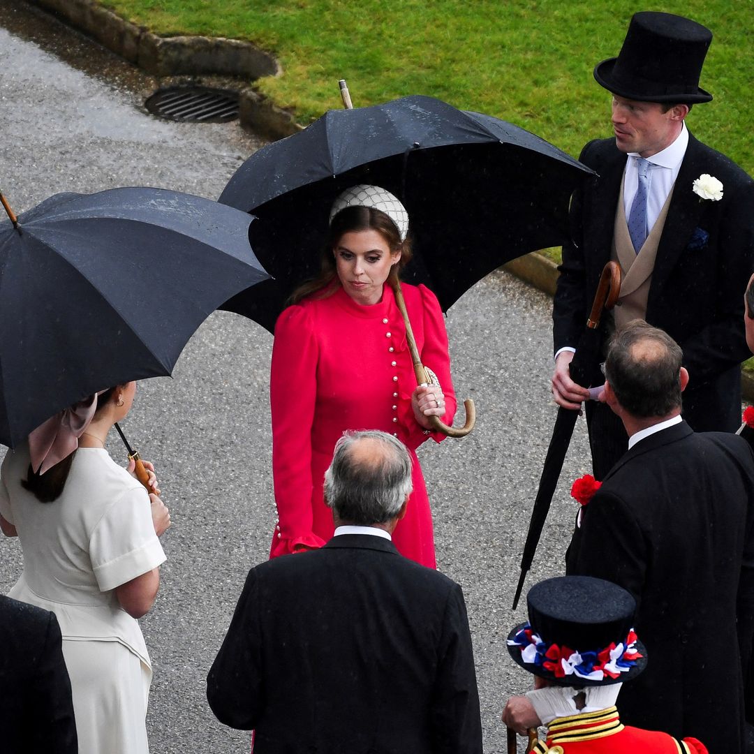 Princess Beatrice has Hollywood moment in waist-defining dress as she braves the rain